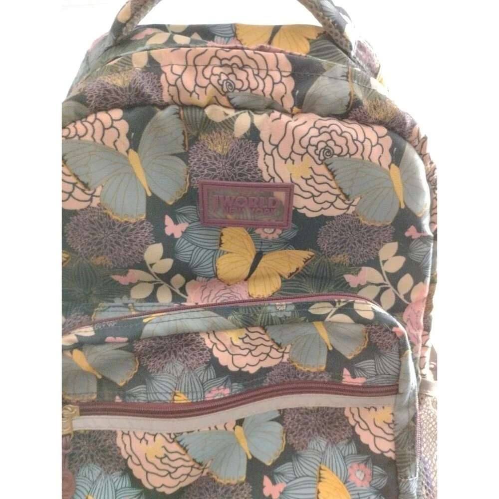 J World New York Rolling Backpack Retractable Handle Mesh Pockets Secret Garden